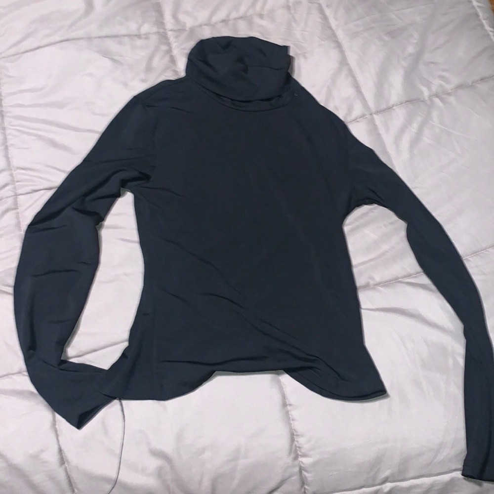 small black turtleneck. never worn.
